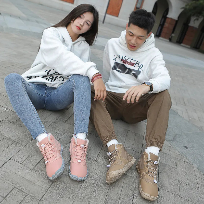 Waterproof unisex snow boots in black, khaki, or pink with round toe and front lace-up.
