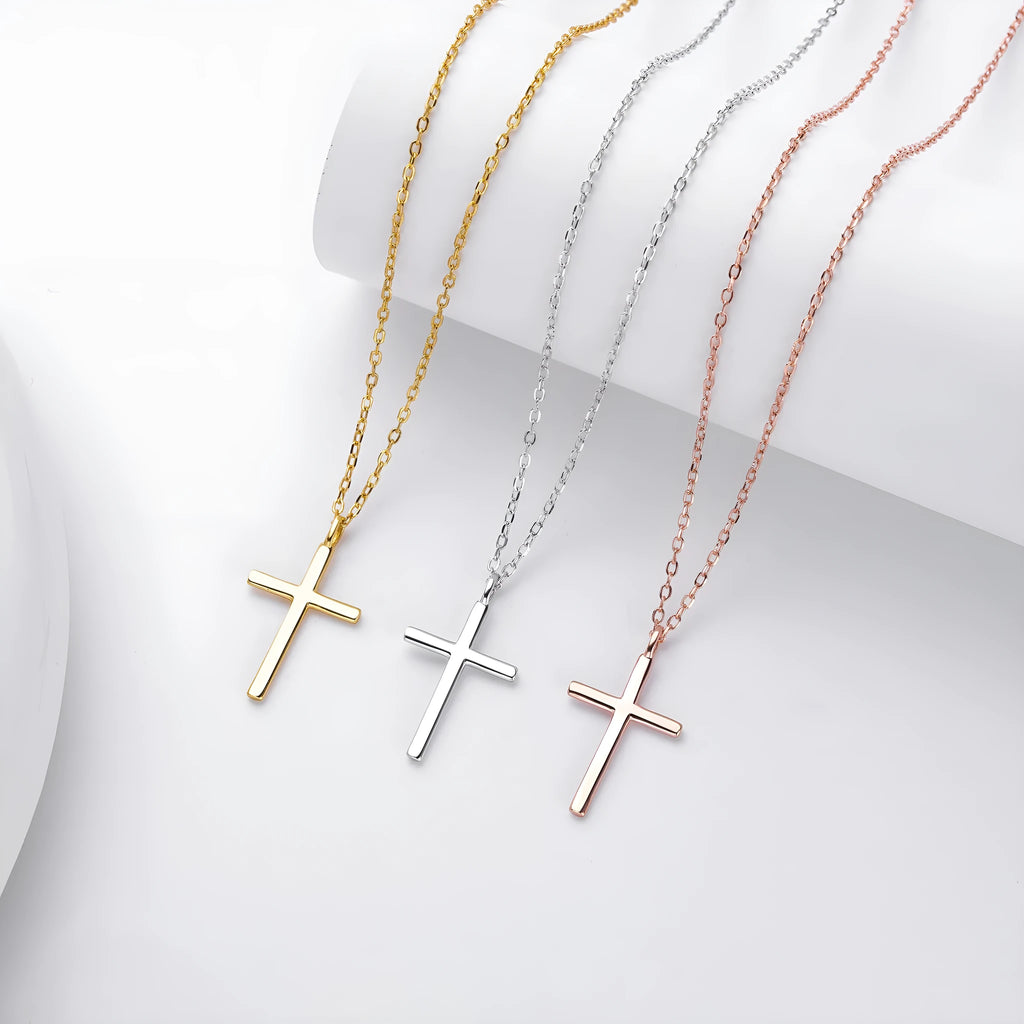 S925 sterling silver cross pendant necklace on an adjustable O‑link chain in a glossy finish.
