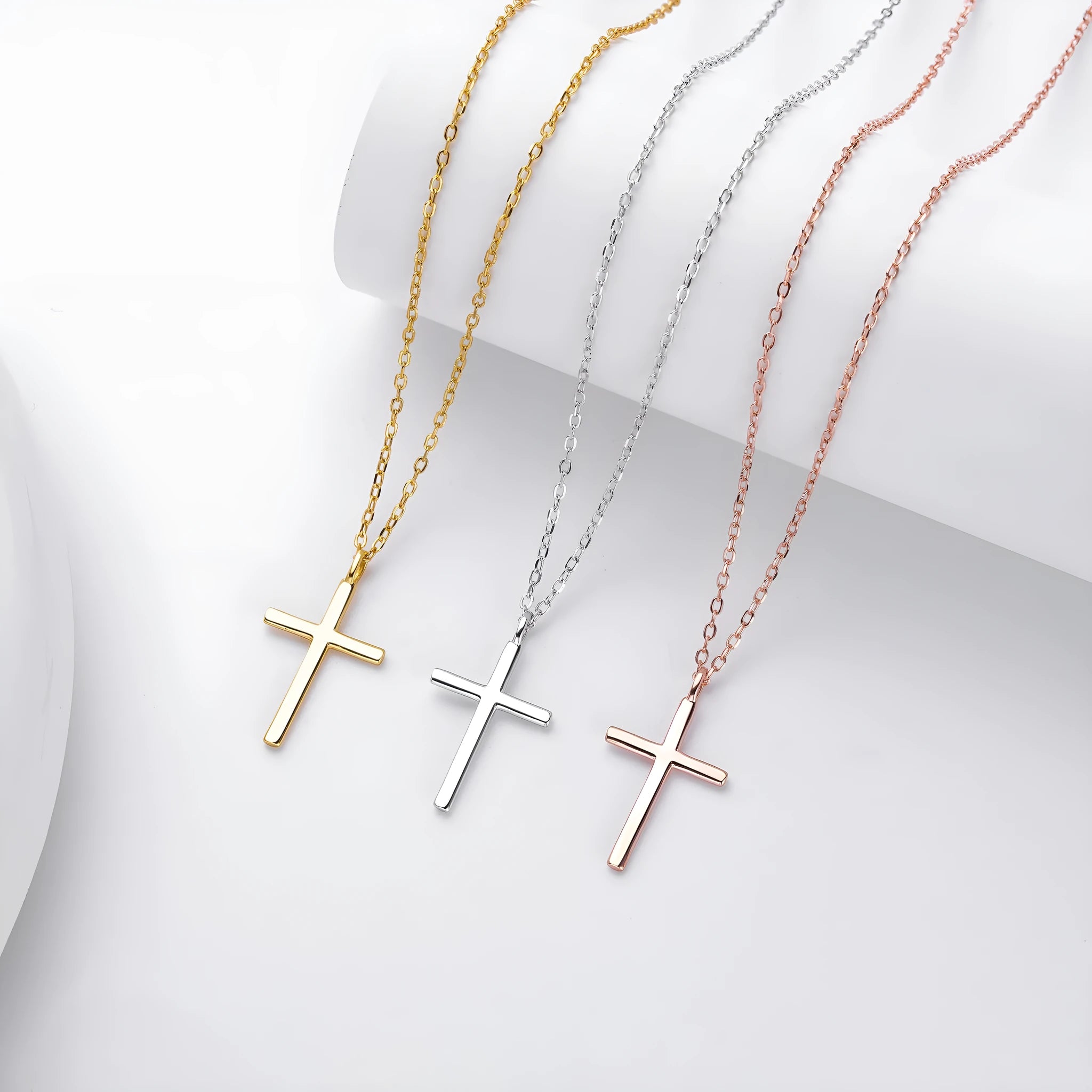 S925 sterling silver cross pendant necklace on an adjustable O‑link chain in a glossy finish.