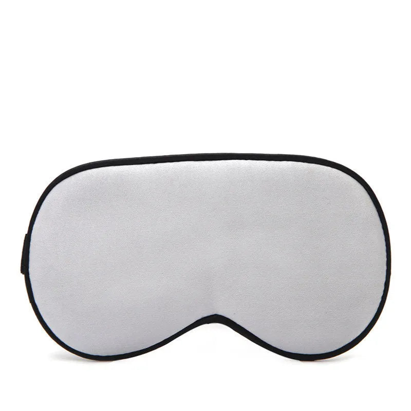 Double-sided mulberry silk sleep mask with embroidered print in various colours.