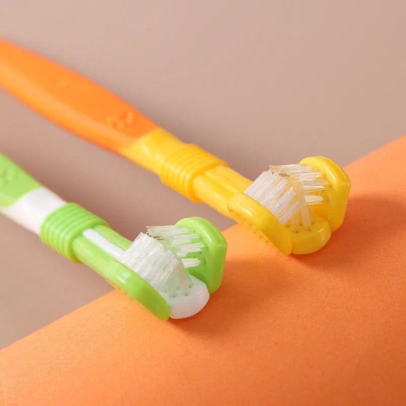 A pet toothbrush with a plastic nylon head and handle, shown in one of its available colours.
