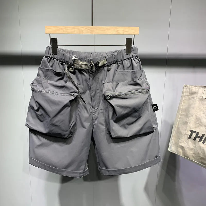 Men's loose-fitting casual shorts with multiple pockets in black or grey colours