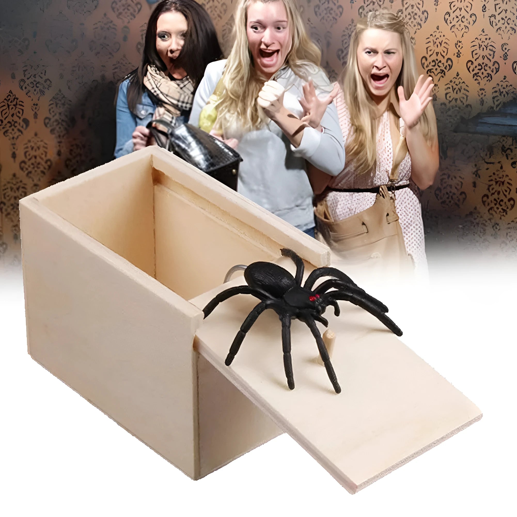 Wooden prank scare box with a lifelike spider figurine on a table.
