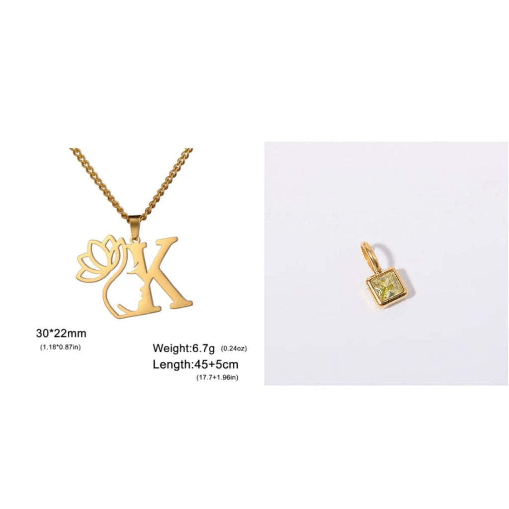 Gold electroplated stainless steel necklace with a cross chain and a letter 'A' pendant on a white background.