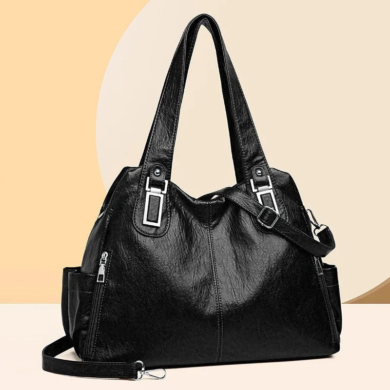 Soft square women's tote bag in various colours with a single shoulder strap and zip pocket inside.