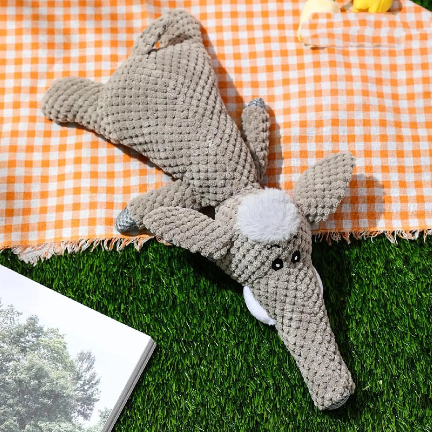 Corn kernel shaped dog plush toy for teeth grinding with interactive sound feature in grey colour