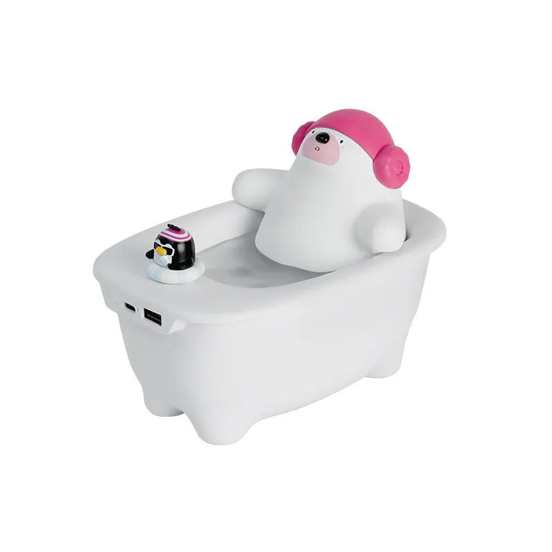 White plastic USB air humidifier with water tank on a desk