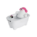 White plastic USB air humidifier with water tank on a desk