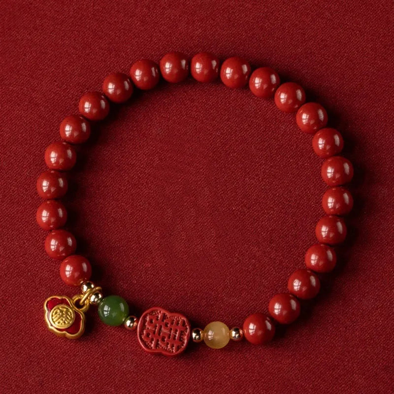 New Chinese style bracelet with emperor sandstone beads and a red Fu character charm.