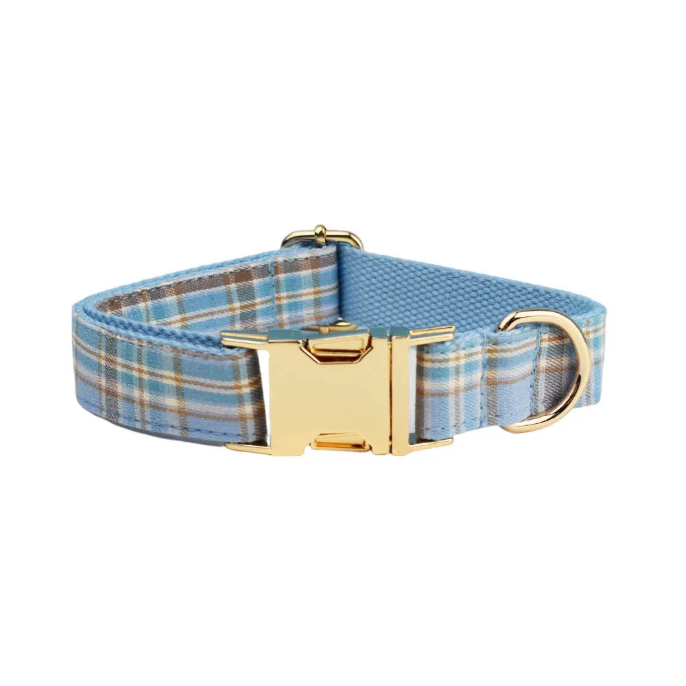 Sky blue grid pattern dog collar and leash set with matching vest and decorative bow