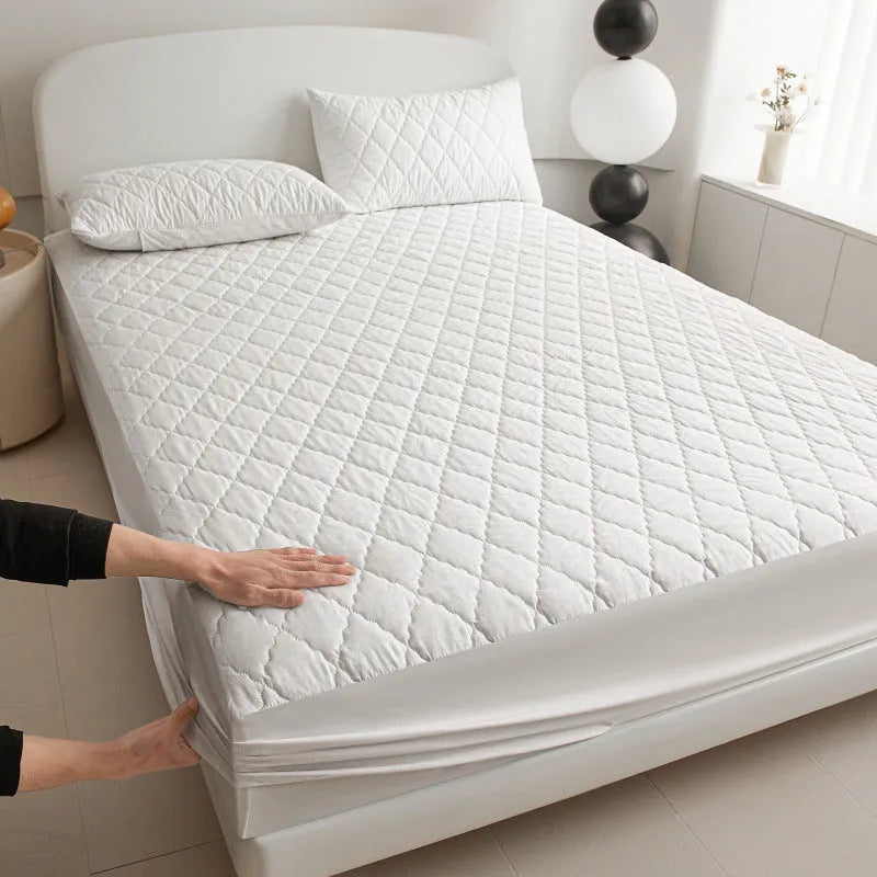 Diamond lattice quilted waterproof mattress protector set with bamboo fibre sheet and pillowcases for a 0.9m bed.