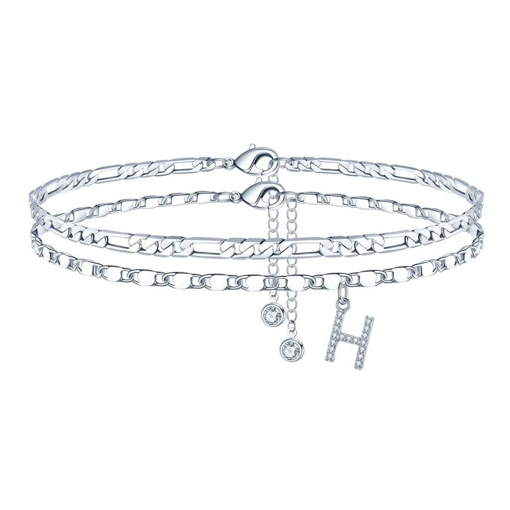 Silver-colour copper double-circle bead anklet with engraved text detail on a neutral background.