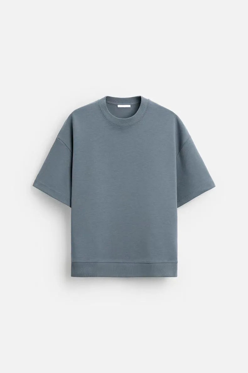 Loose double-sided cloth texture short sleeve shirt and matching shorts casual set on a hanger.