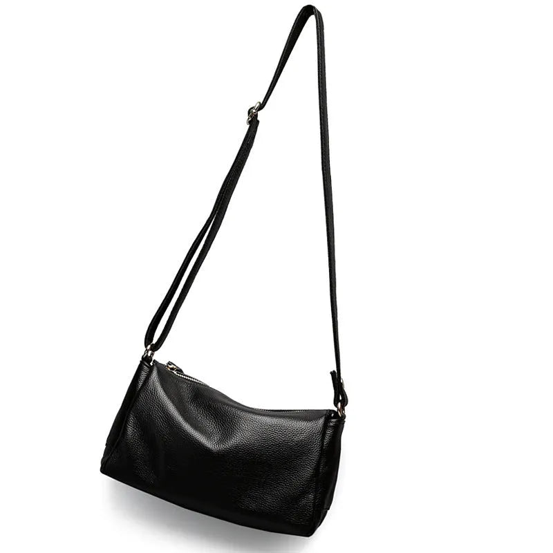A soft genuine leather women's crossbody bag in a horizontal square shape, shown in one of four available colours.