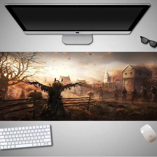 Large Halloween-themed rubber cloth mouse pad on a desk, showing non-slip backing and graphic design.