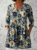 Women's retro print long-sleeved polyester top on a hanger, showing slim fit and detailed digital pattern.