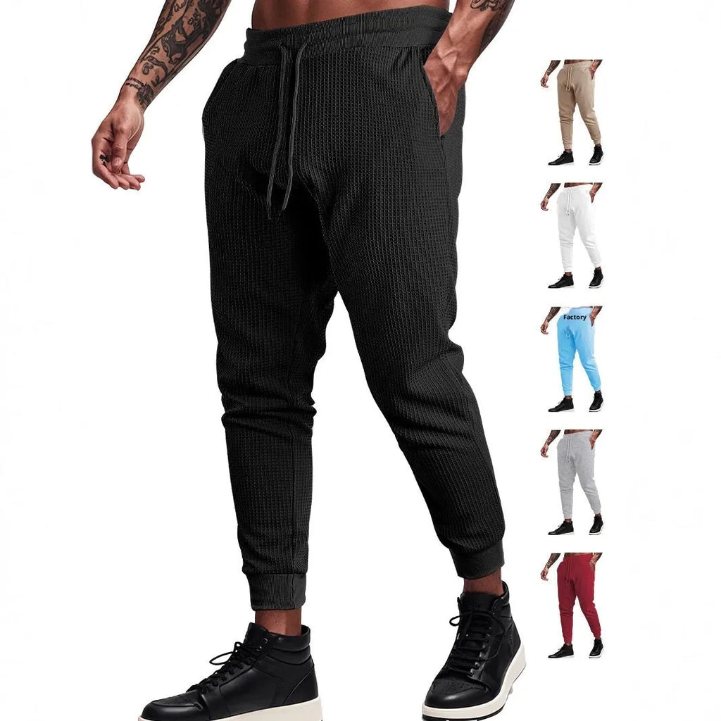 Men's casual loose solid colour waffle knit drawstring pants in khaki, front view, on white background