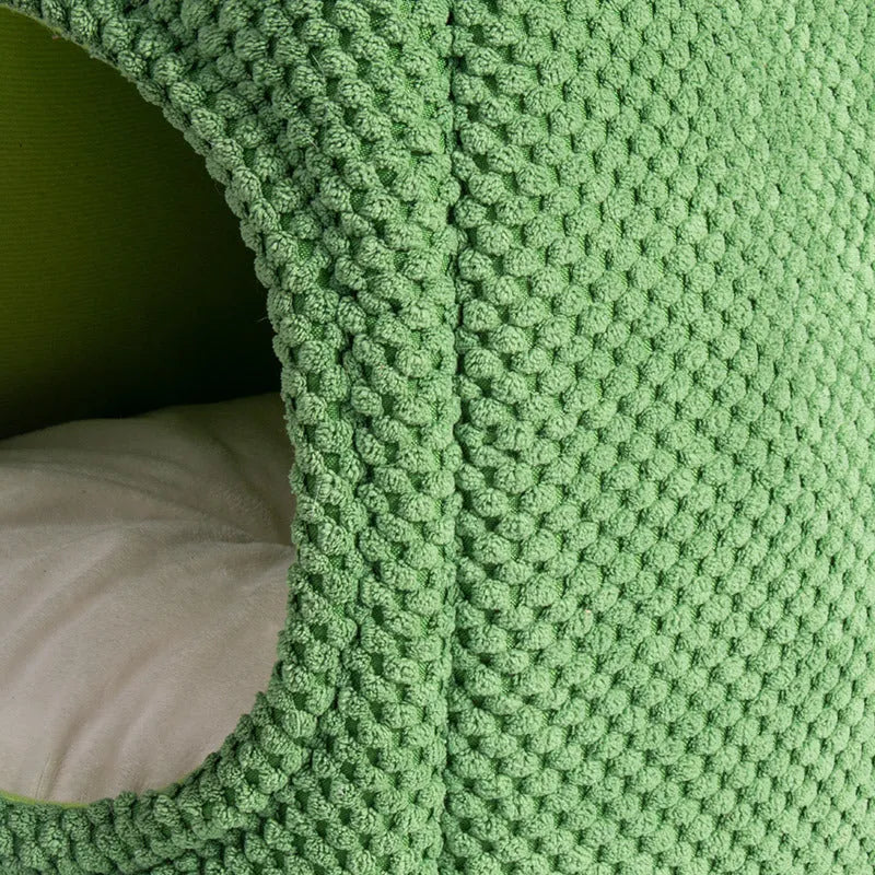 Green cactus-shaped enclosed cat bed tent with a plush cushion inside for kittens or small dogs.
