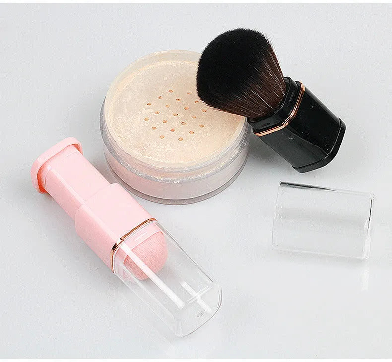 Portable retractable makeup brush with black telescopic handle and artificial fibre bristles for powder blusher application