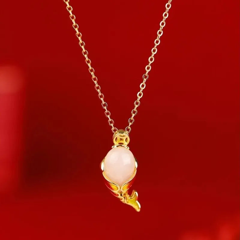 Copper women's necklace with lucky koi pendant on red rope hand strap
