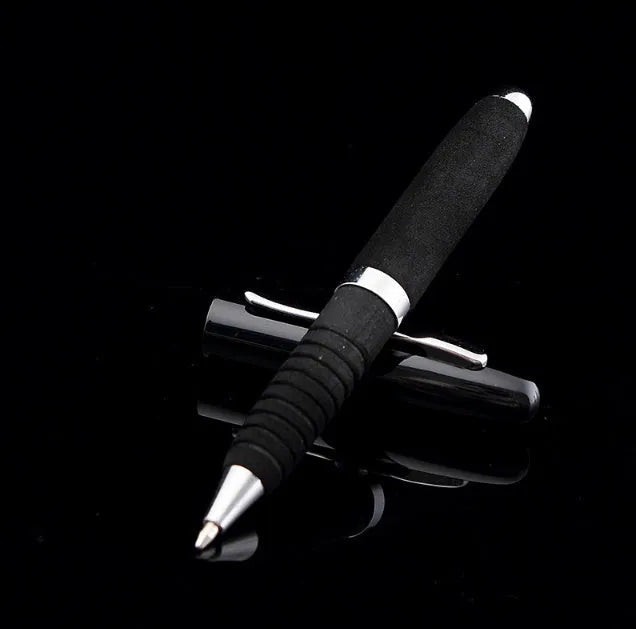 Silver EVA metal cap ballpoint pen with a 1.0mm tip on a notepad.