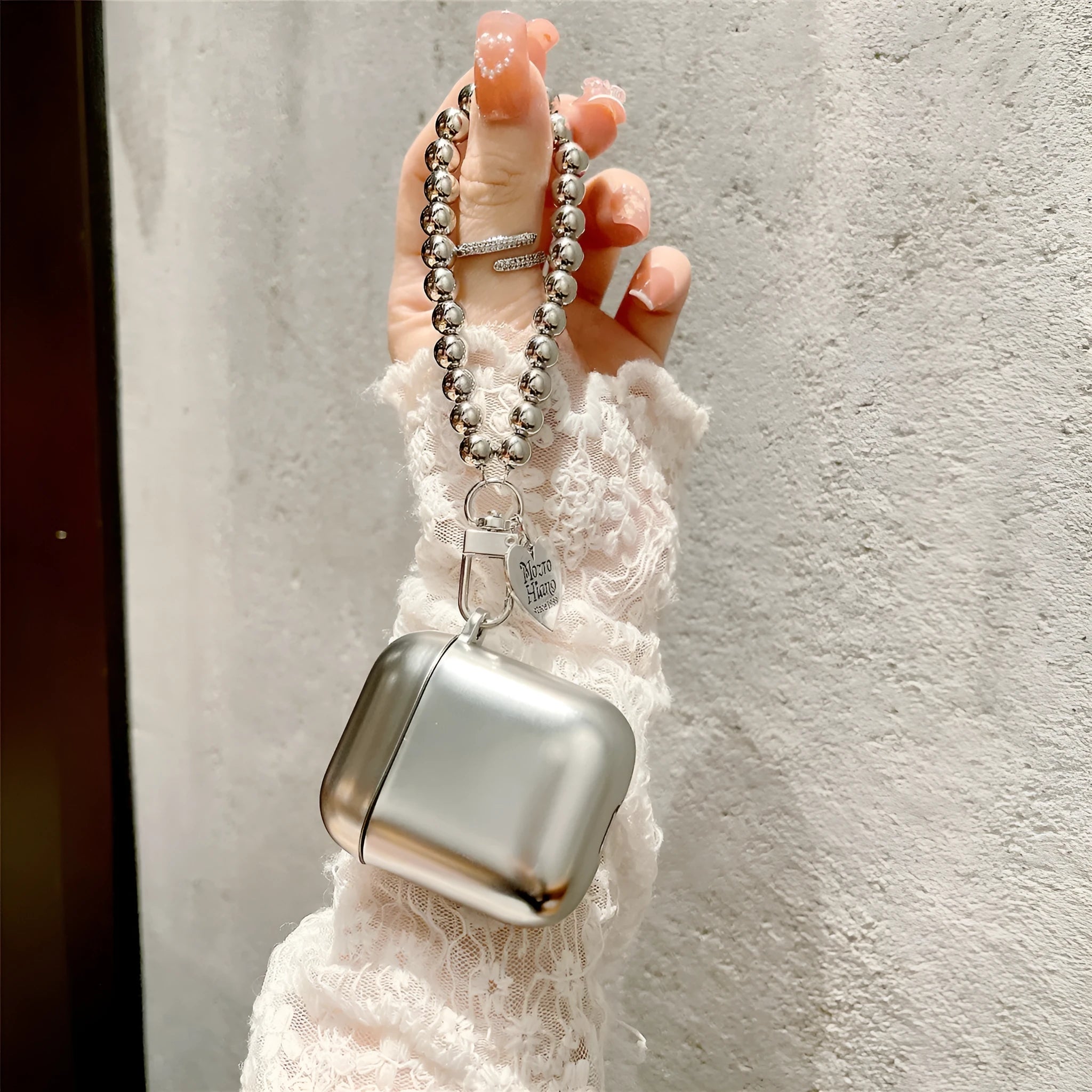 Matte plating protective case for Apple AirPods showing TPU material and electroplating finish.