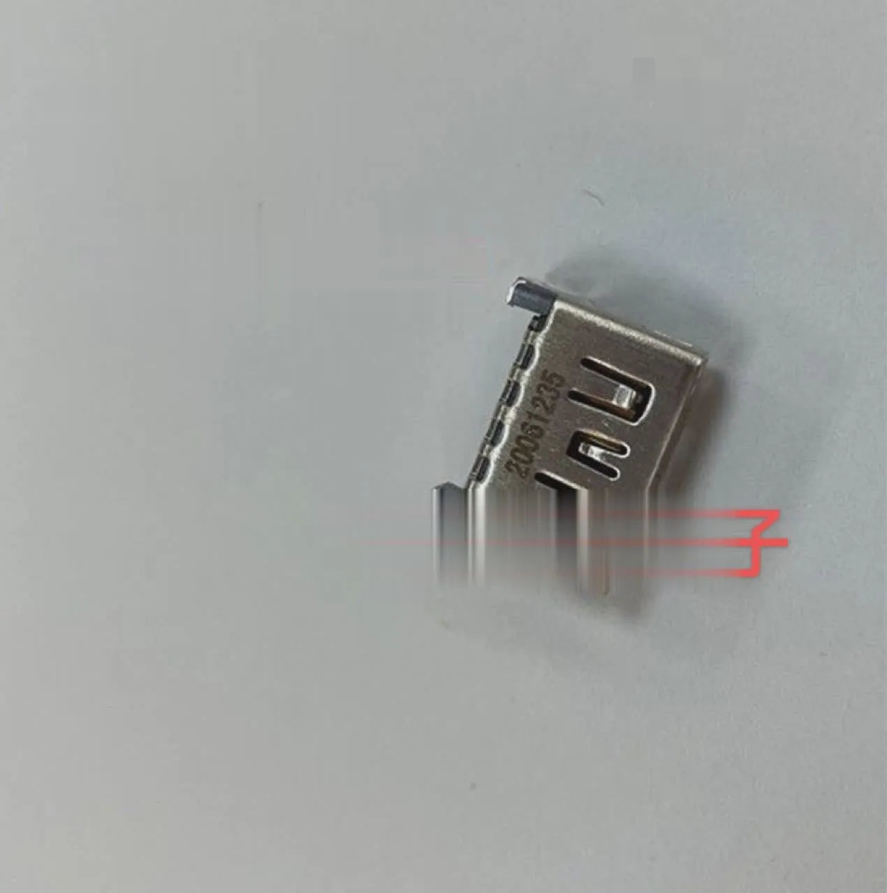 Silver metal HDMI host interface socket for device integration.
