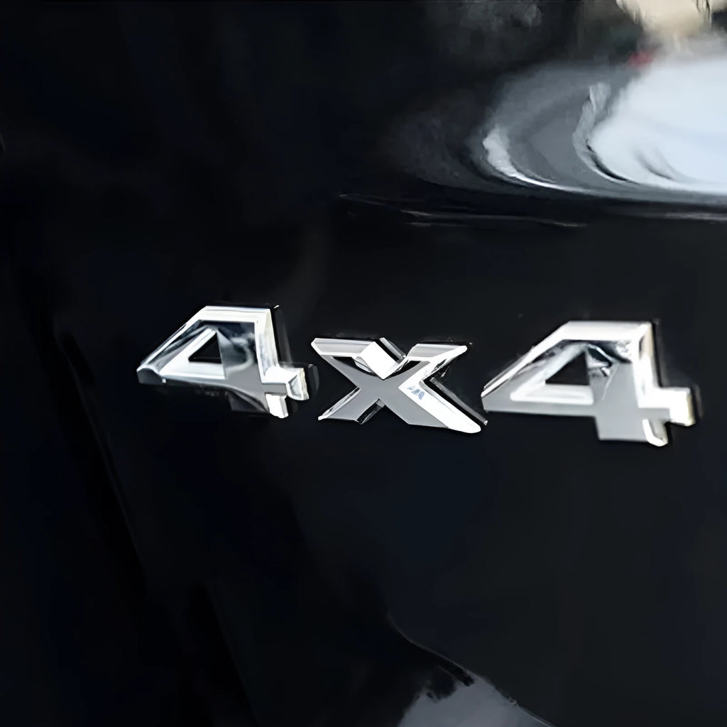 Metal 4x4 off-road rear car badge in electroplated silver finish measuring 9cm by 3.5cm