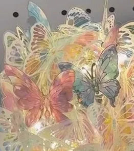 Handmade butterfly night lamp with glass shade and raw wood base measuring 12x15cm