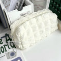 Fabric pencil case with cream puff design in beige colour option showing polyester material construction