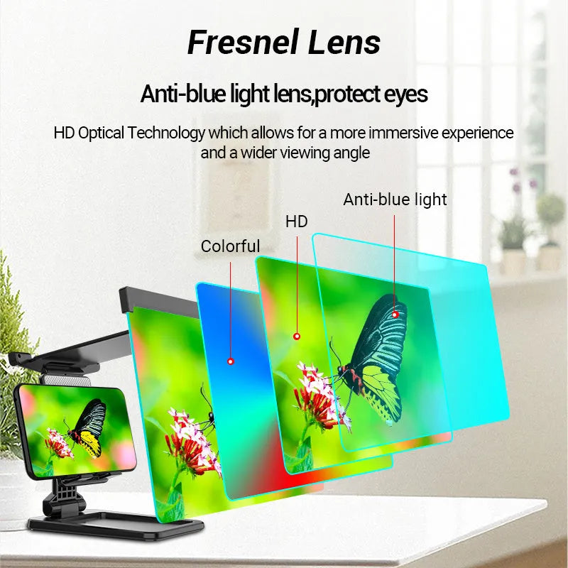 Black foldable mobile phone screen amplifier and detachable holder set up on a desk.