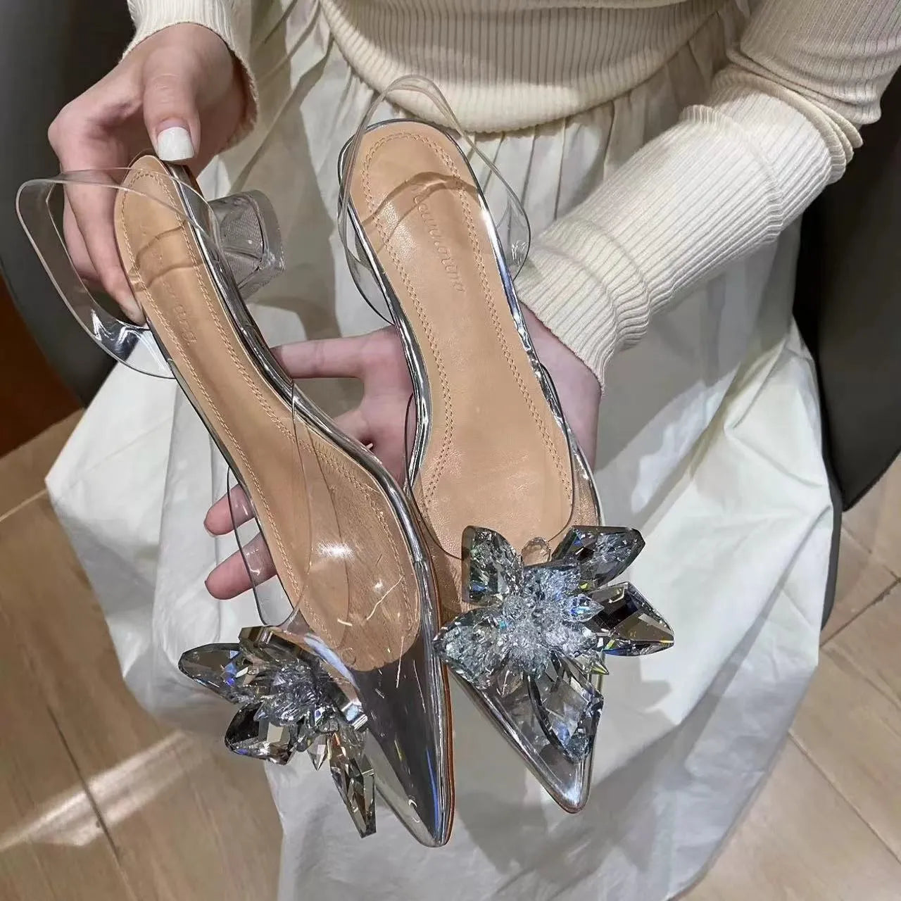Women's transparent high heels with crystal flower detailing and pointed toe in microfiber