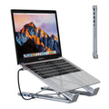 Silver aluminium foldable laptop stand with integrated multi-port docking station and a short connection cable.