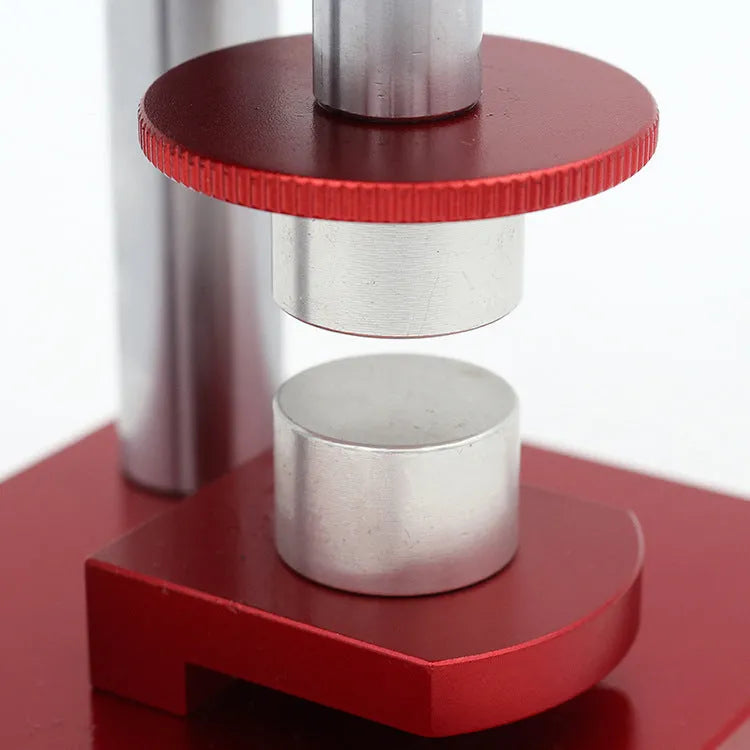 A watch back cover press tool with a spiral mechanism and a set of 20 plastic moulds for watch repair.