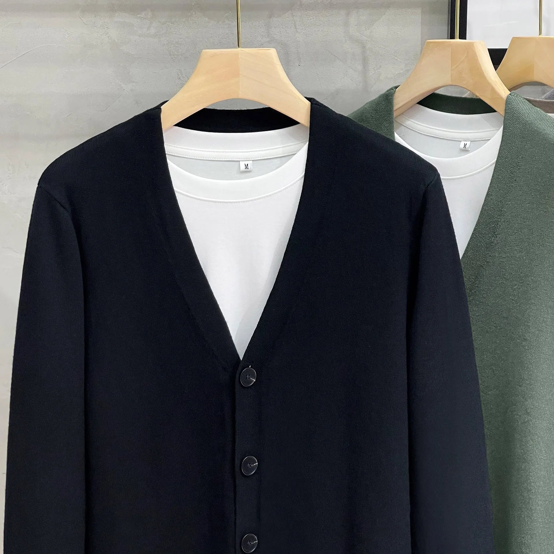 Men's cotton knitted cardigan sweater coat in black, V-neck, long sleeves, loose fit, winter casual wear.