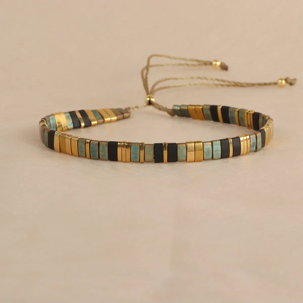 Geometric beaded bracelet with round glass and coloured glaze beads in five colour options.