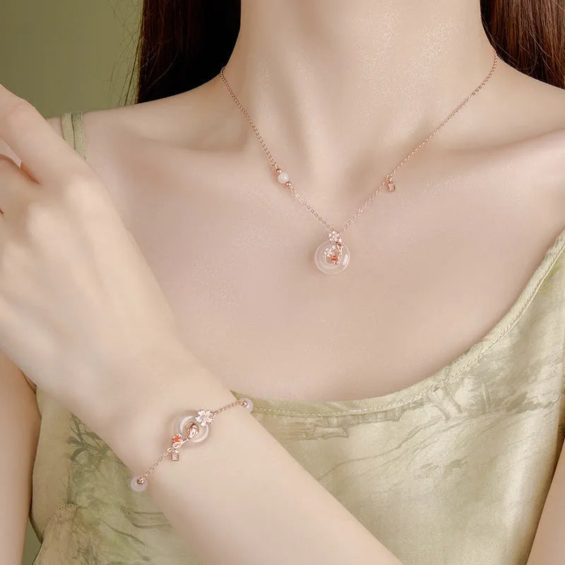 S925 sterling silver bracelet with white chalcedony crystals on a wrist