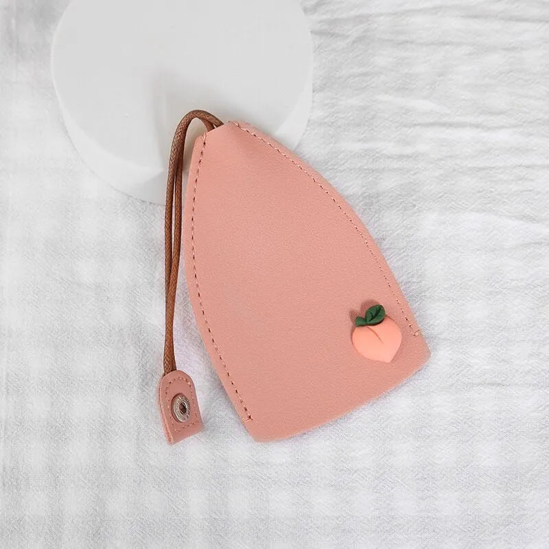 Colourful cartoon PU leather pull-out key case for car keys, shown open and closed