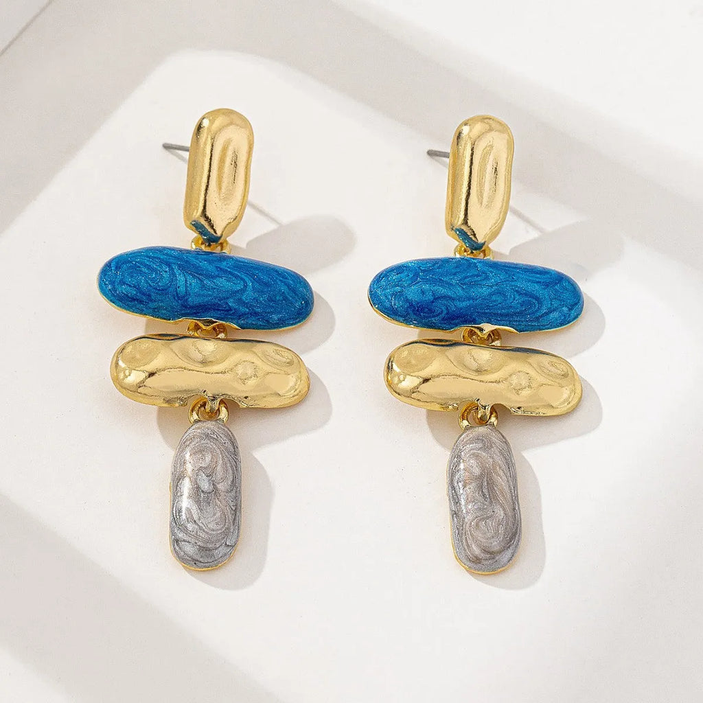 A pair of women's geometric stud earrings with a multicolour electroplated finish on zinc alloy.