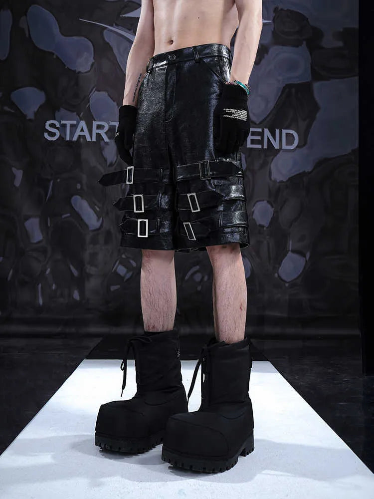 Men's black PU leather cropped pants with distinctive ring detailing and stretch fabric