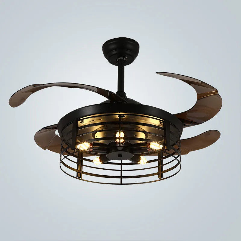 American retro style ceiling fan with clear acrylic blades and an integrated acrylic lampshade, remote control on a table.