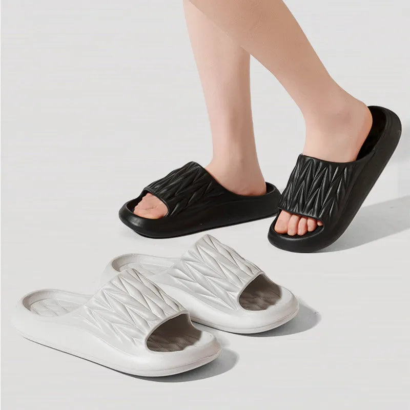 Leaf texture pattern EVA slippers for men and women in various colours on a white background.
