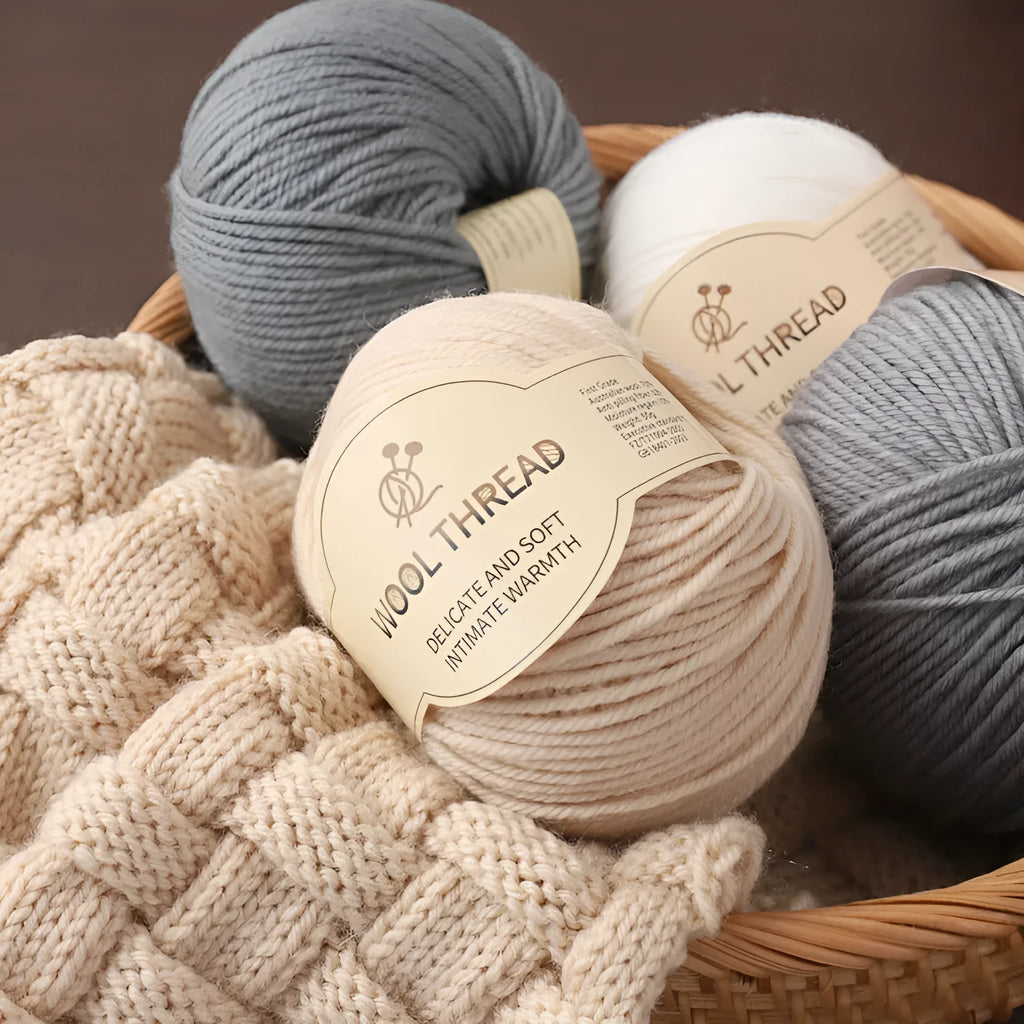 A roll of hand-knitting wool yarn in one of 30 colours, such as beige camel or rose red, for baby clothes.