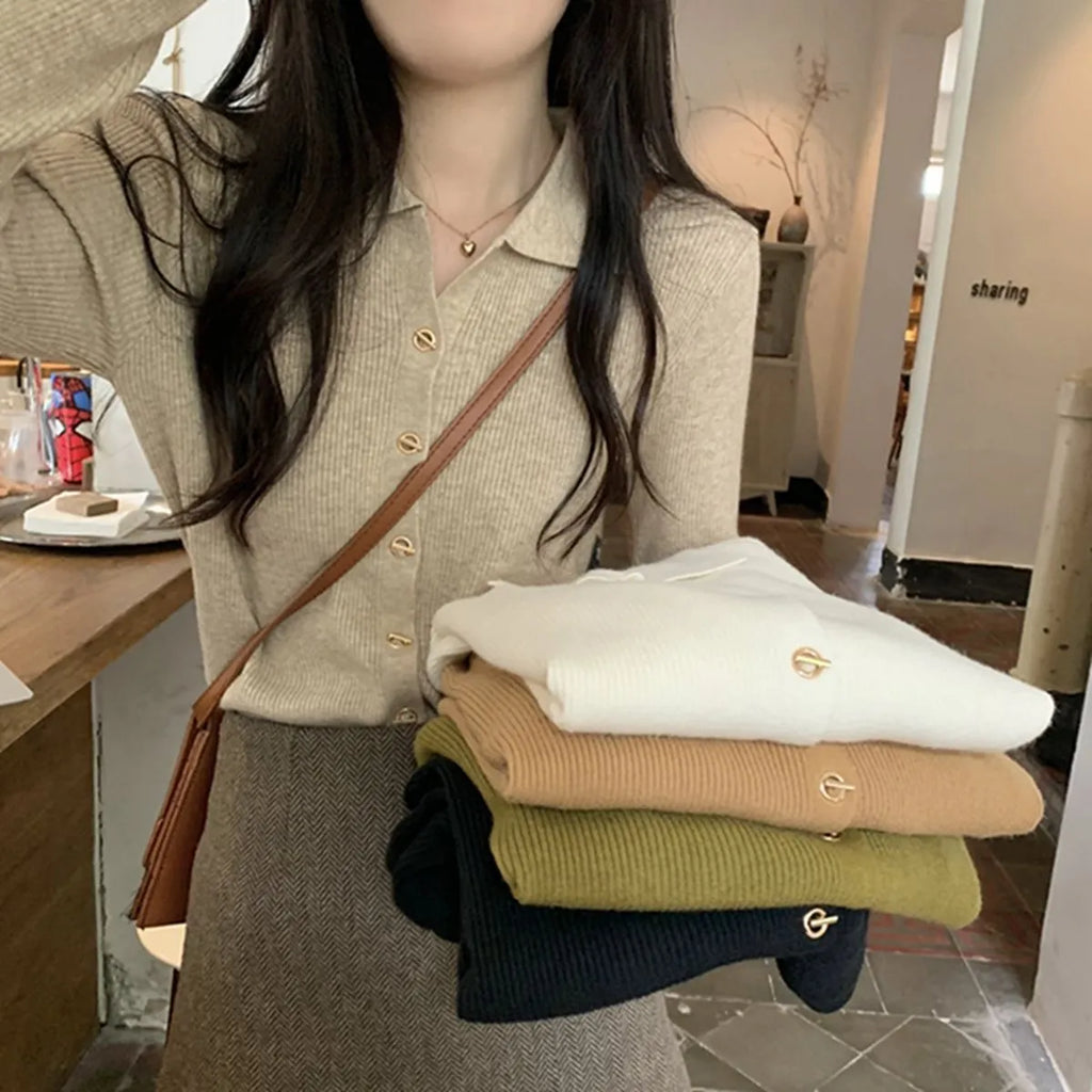 Women's long-sleeved loose fit viscose cardigan top in beige, shown as a layering piece.