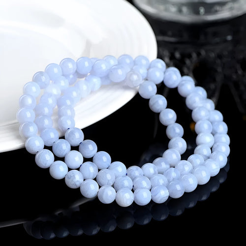 Original blue agate bracelet with multi-circle patterned beads and Ruyi design elements.