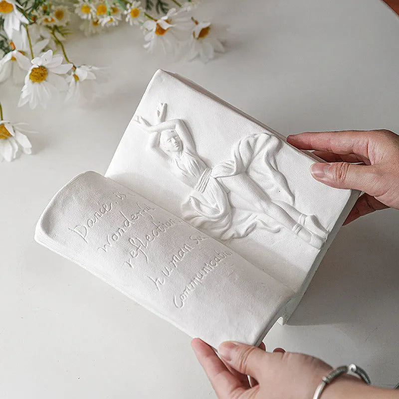 Glazed ceramic book stand in a modern design, acting as a desktop organiser and decorative ornament.