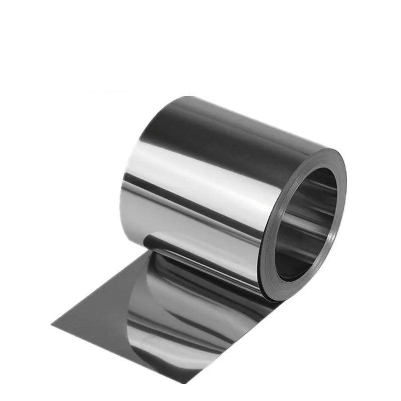 Close-up of a rolled 304 stainless steel metal strip with a leather item, showing its metallic finish and dimensions.