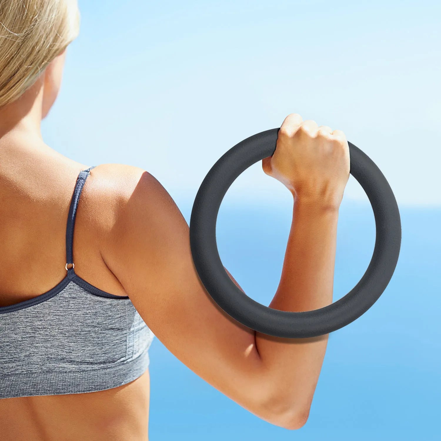 Black silicone coated iron exercise hoop 32cm diameter 4.5kg on indoor floor