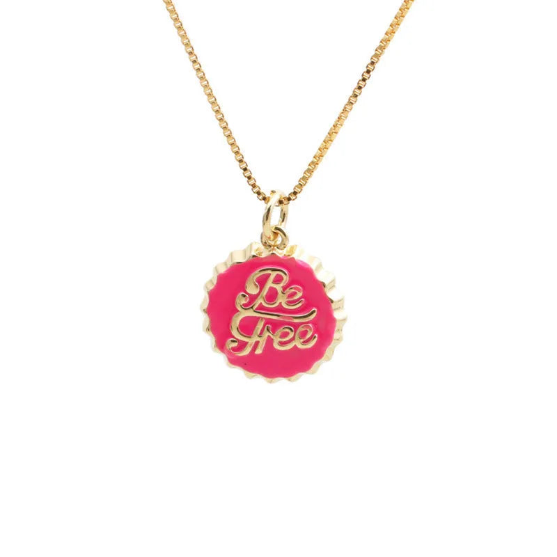 Copper Be Free bottle cap pendant necklace with a gold-plated finish on a 40cm box chain.
