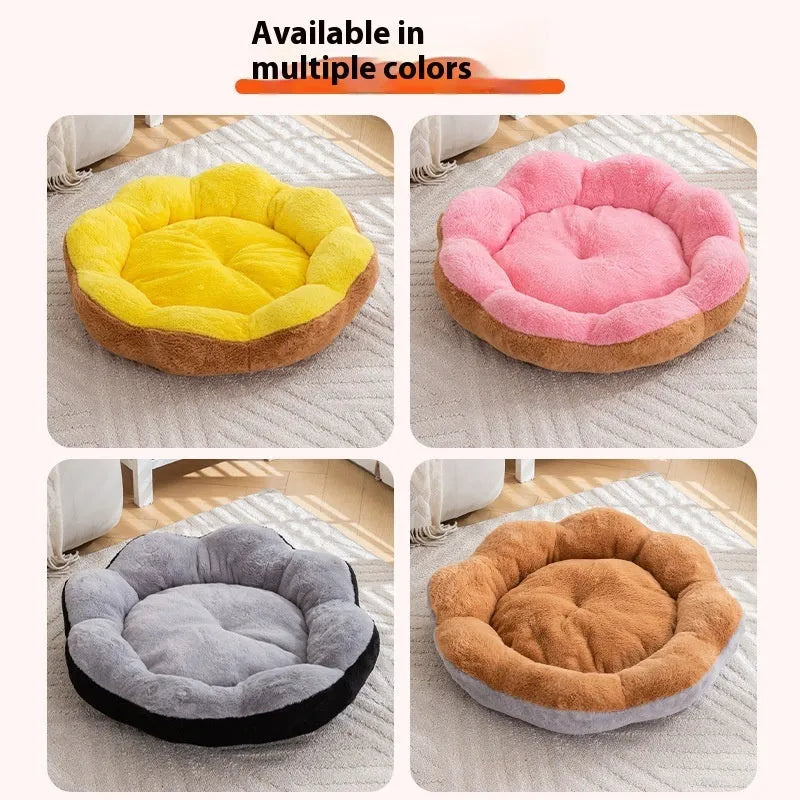 Round grey and black plush cat bed with high walls and a removable inner nest liner.
